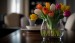stock-photo-tulips-in-a-glass-vase-1063511748